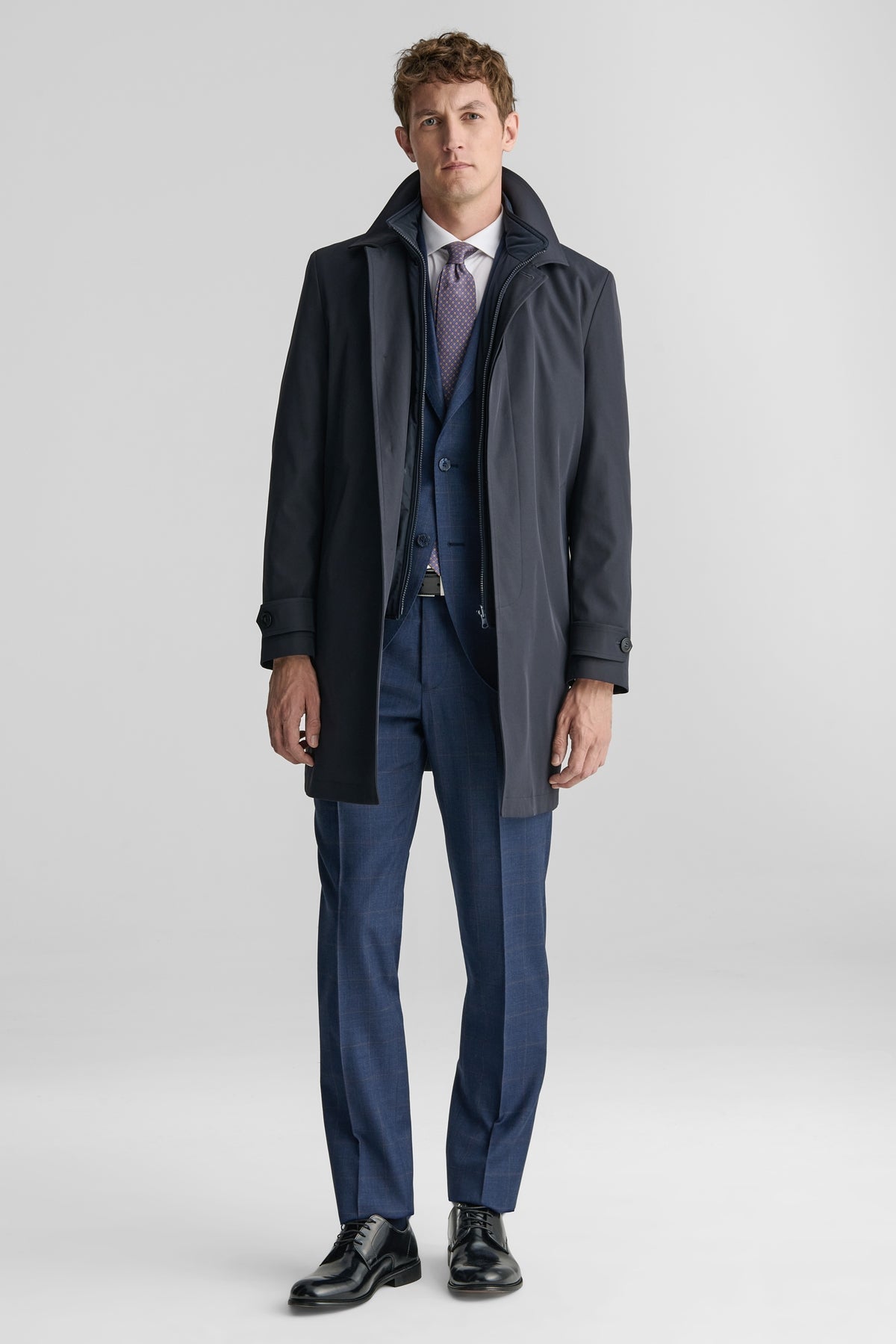 Giubbino lungo con gilet.