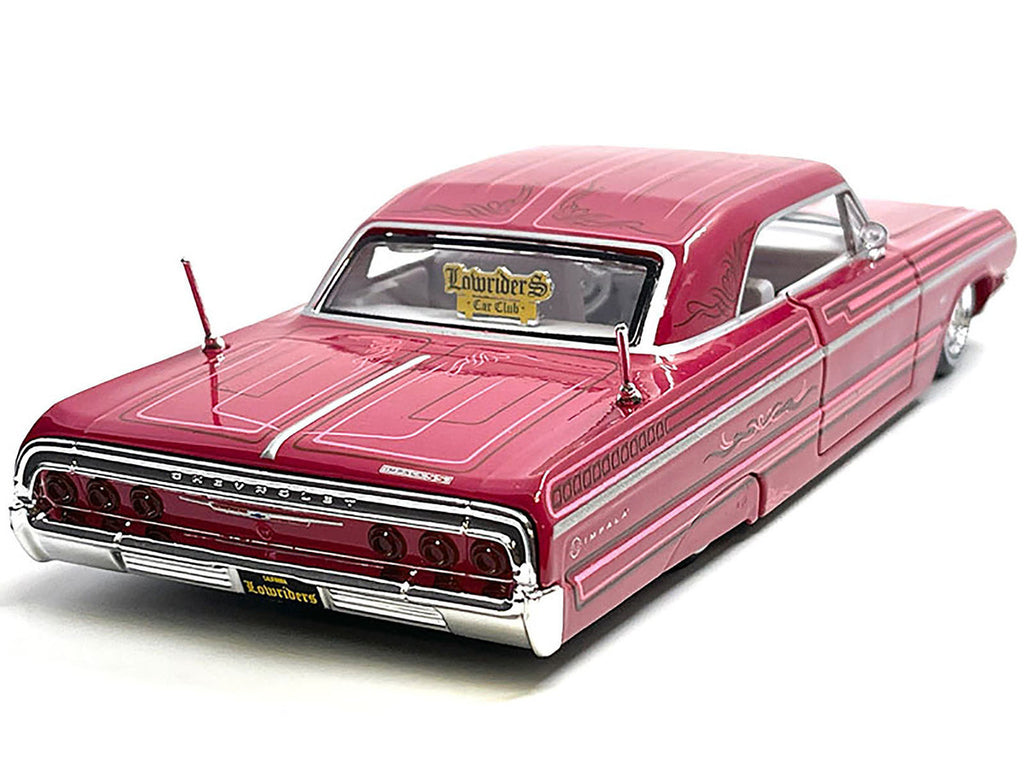 1964 Chevrolet Impala SS Lowrider Pink with Graphics and White Interior "Lowriders" "Maisto Design" Series 1/26 Diecast Model Car by Maisto-1