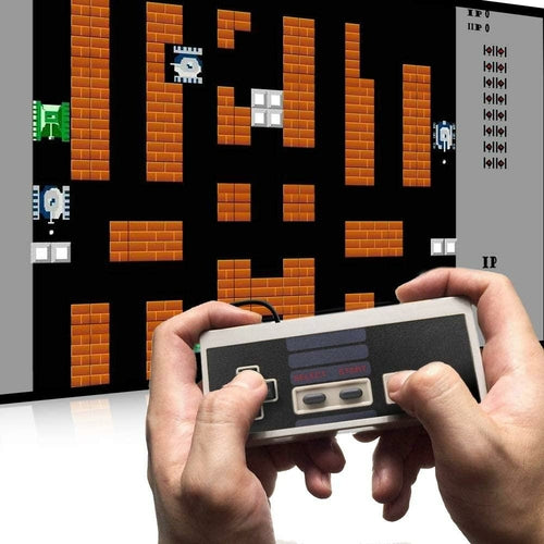 Retro-inspired game console controller held in hands, with a pixelated game displayed on screen, featuring a brick wall design.