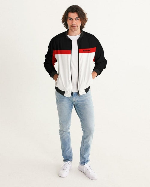 Men's bomber jacket featuring a black, white, and red color block design, with ribbed cuffs and hem. Model wears relaxed fit.