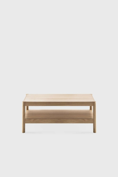 Light wooden Citizen Side Table featuring a smooth rectangular top and a lower shelf for storage.