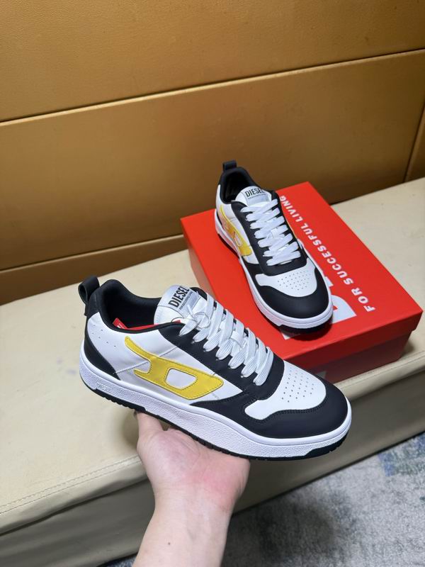 Svartvita Diesel sneakers med gul sidodetalj och vita skosnören