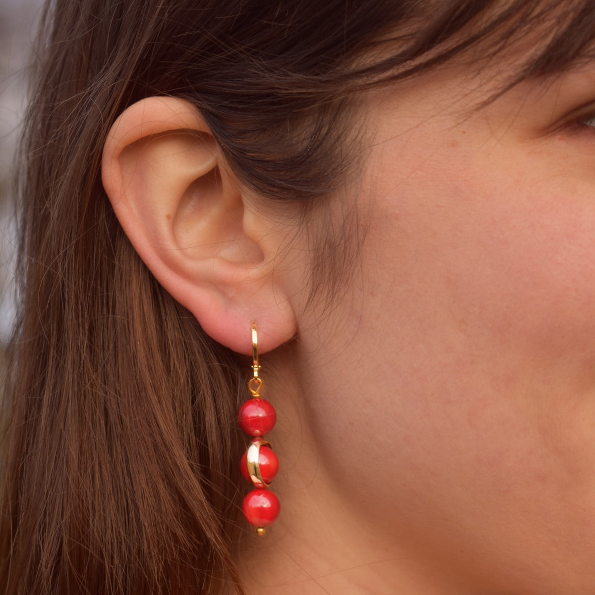 Coral gemstone asymmetric gold huggie earrings | by Ifemi Jewels-1