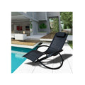 Black zero gravity rocking chair recliner with PVC mesh fabric and a solid powder-coated steel frame, placed by a pool.