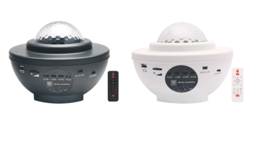 Colorful starry sky galaxy projector in black and white, featuring a dome light and remote control for Bluetooth music.