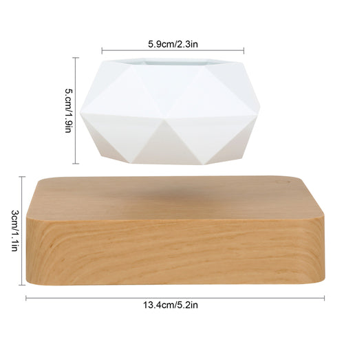 Levitating bonsai flowerpot with a geometric white pot and light grain wood base, designed to float and rotate.