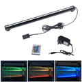 Waterproof RGB aquarium light featuring a sleek black design with remote control, power adapter, and an adjustable color spectrum.