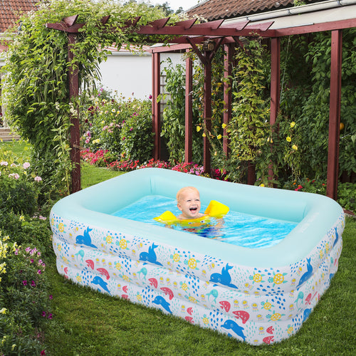 Indoor & outdoor inflatable swim pool for kids features a colorful design with snails and flowers, filled with water, and a child wearing yellow floaties.