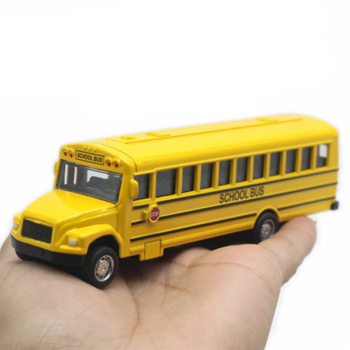 Yellow school bus model toy with black stripes, held in a hand; made of alloy with detailed features and pull-back function.