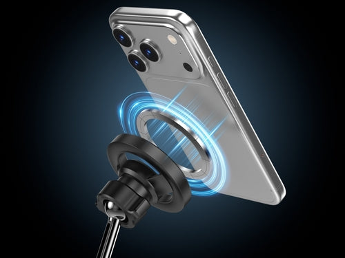 Magnetic car mount with a vacuum suction base, holding a smartphone, featuring a shiny silver finish and a circular design.