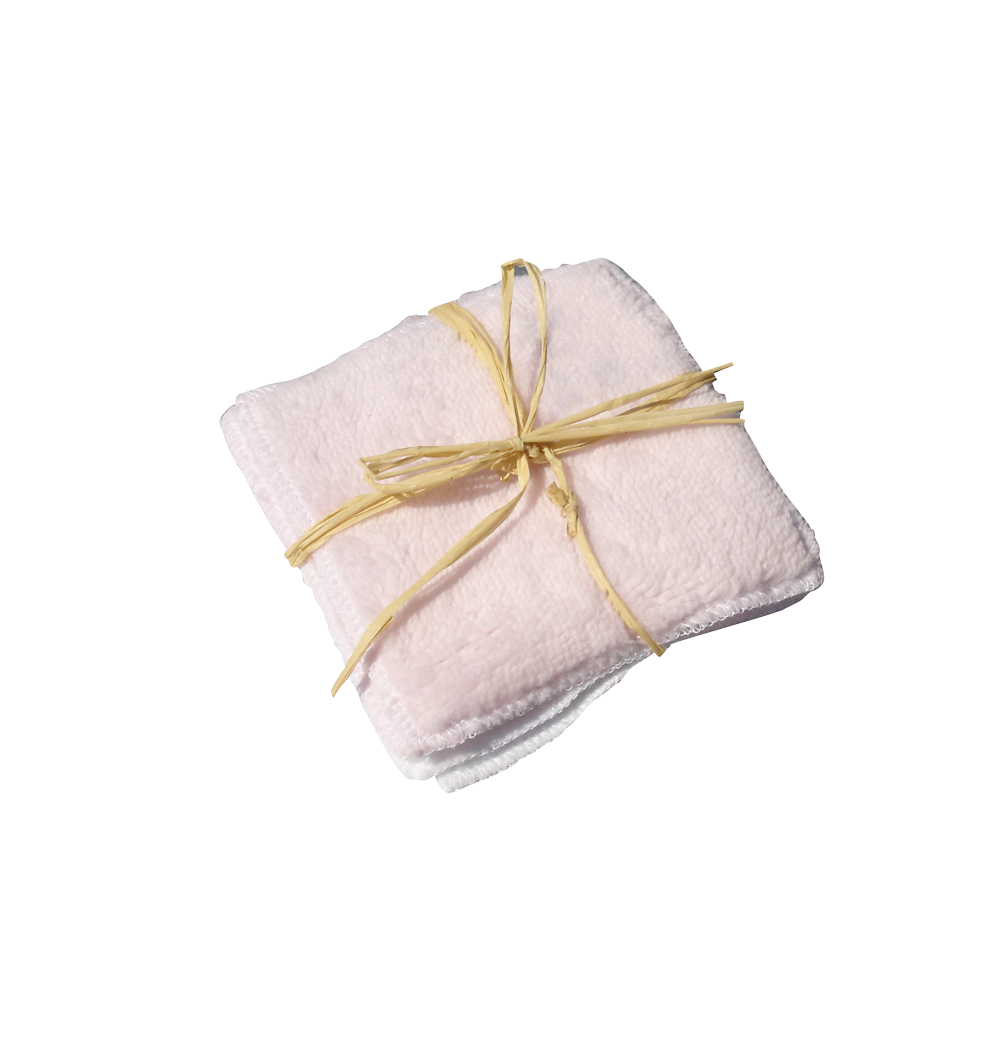 multiples lingettes blanche et rose avec un noeud de raphia